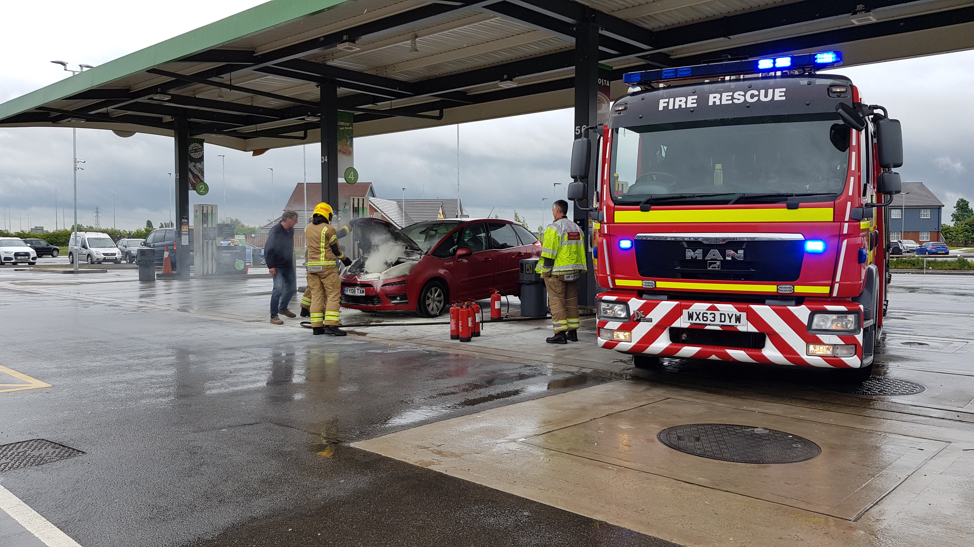 Car on fire at petrol station forecourt The Voice