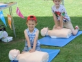 Oliver (4) and Benjamin Vaughan (8) learn CPR. Activate! Holbeach