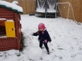 Amanda Ogonowska (2) makes her first snowman