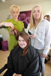 Nikki Taylor with salon owner Jo Barrett and hairdresser Alana Smith