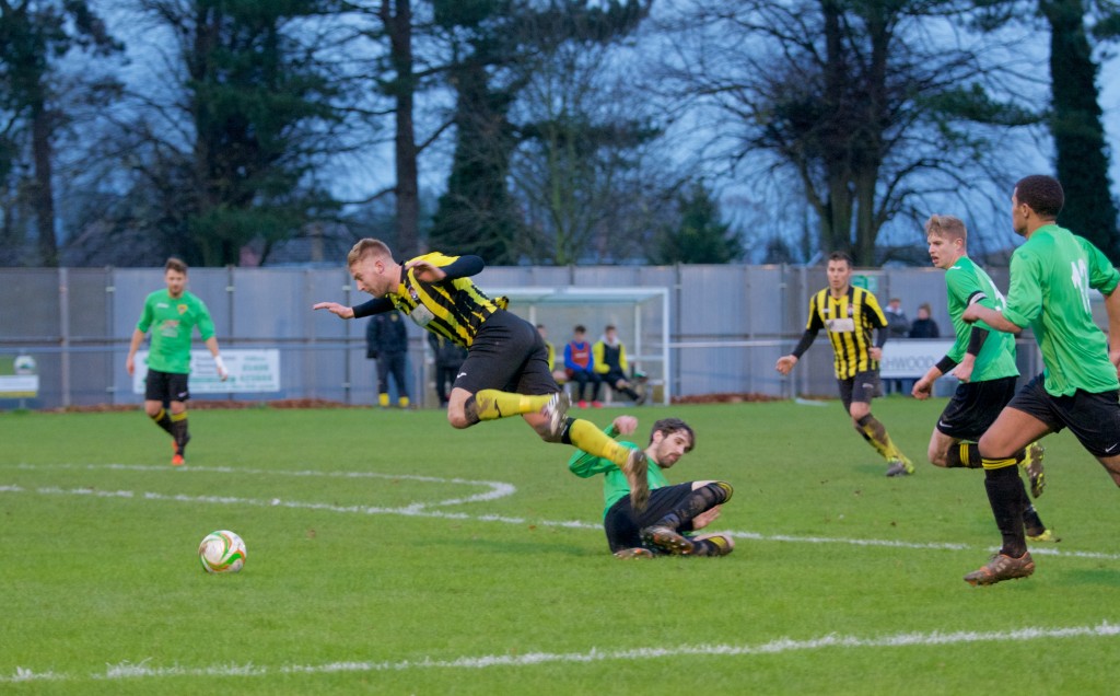 PENALTY: Lee Beeson is brought down by Jack Burrows. Beeson netted the spot kick to make it 2-0. Photo: STEVE RELF