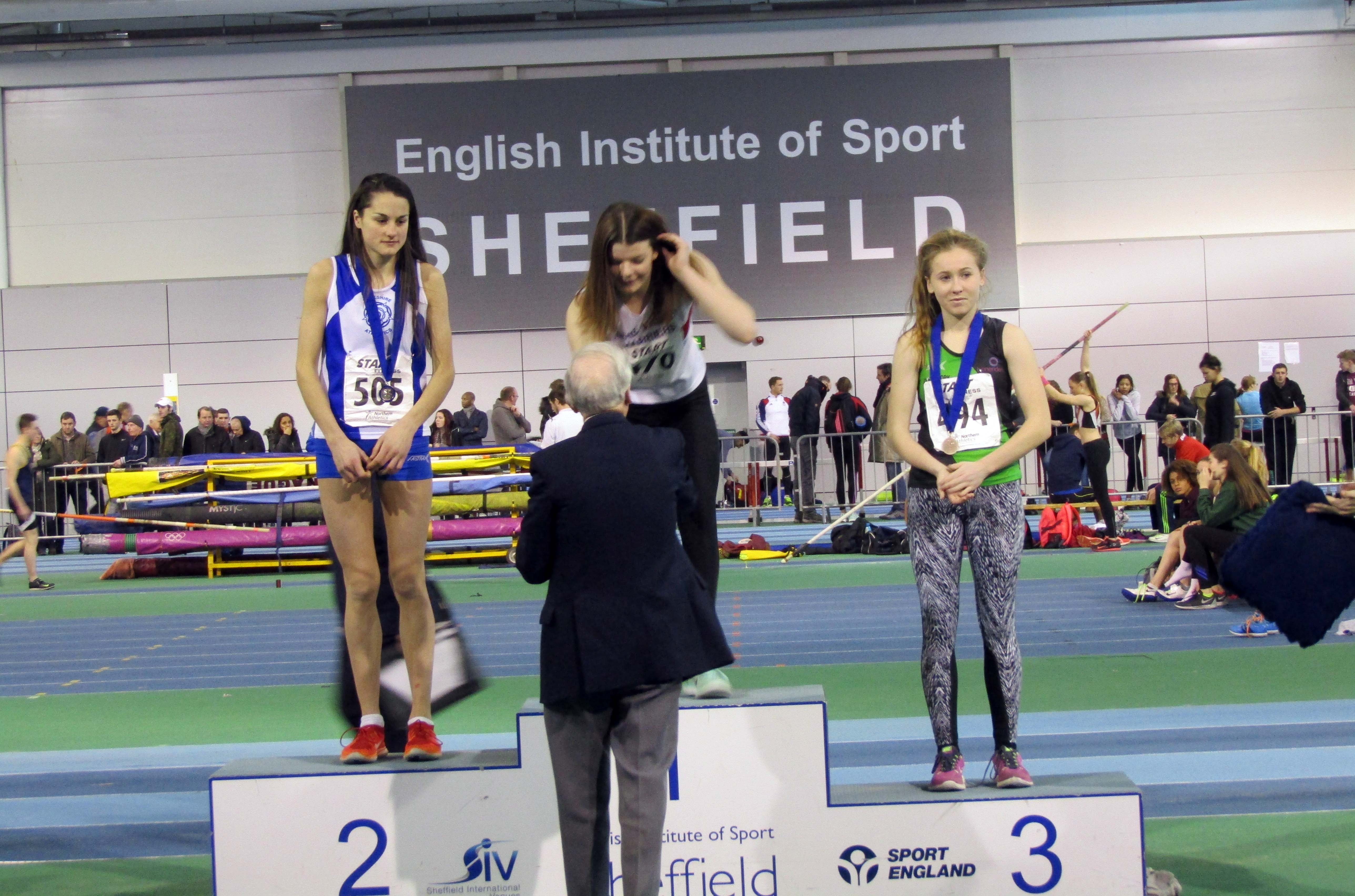 WINNER: Hannah Molyneaux collects her gold medal.
