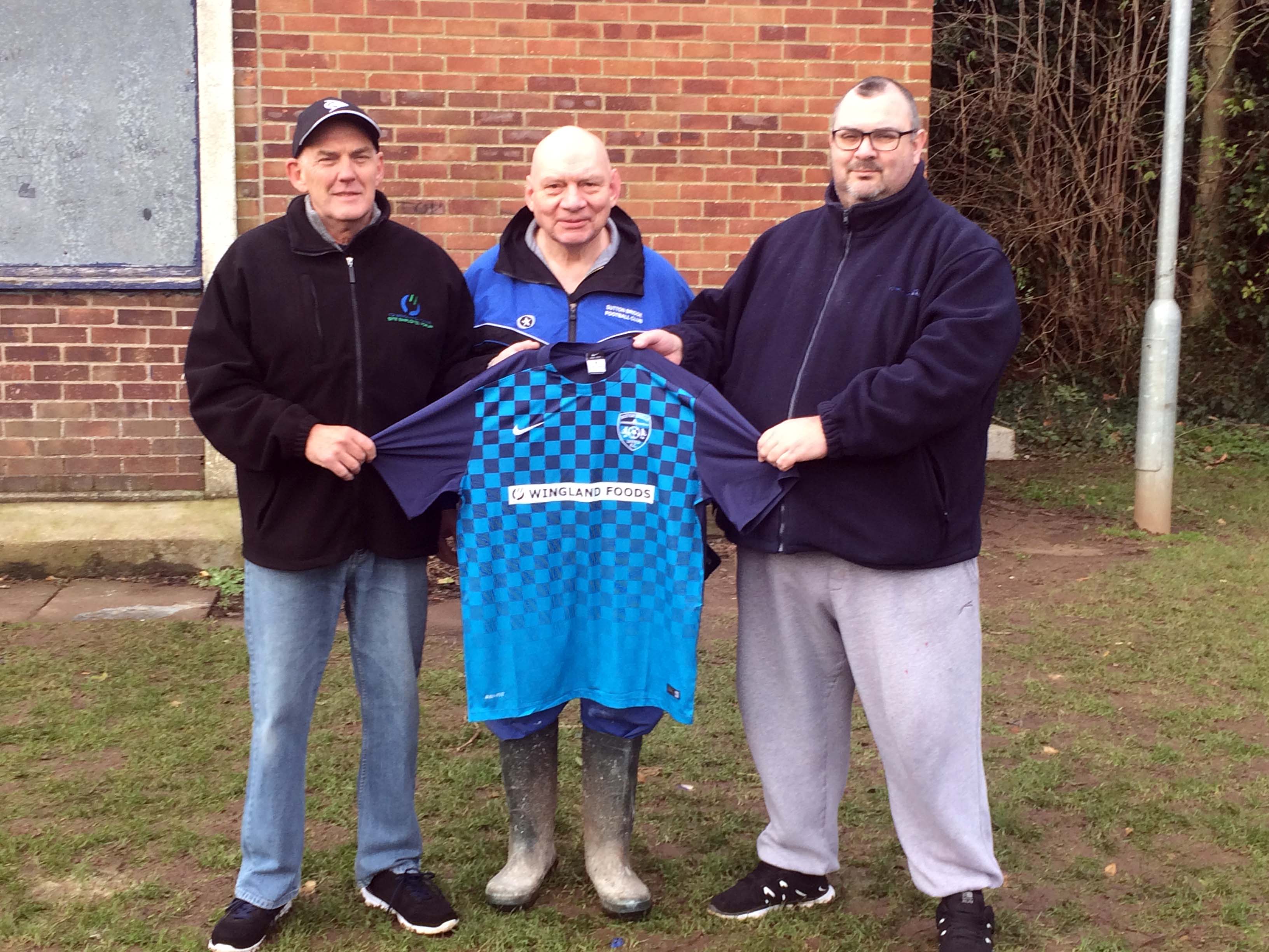 SPONSORED SHIRT: From left – Malcolm Hedges (of Wingland Foods), Sutton Bridge United secretary David Earth and Mark Aston (also of Wingland Foods) with the new reserve shirt.