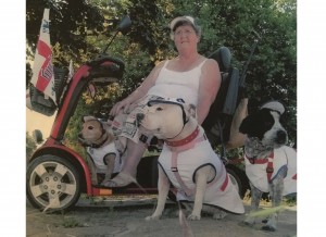 Sheila with her three dogs, one of which has recently died