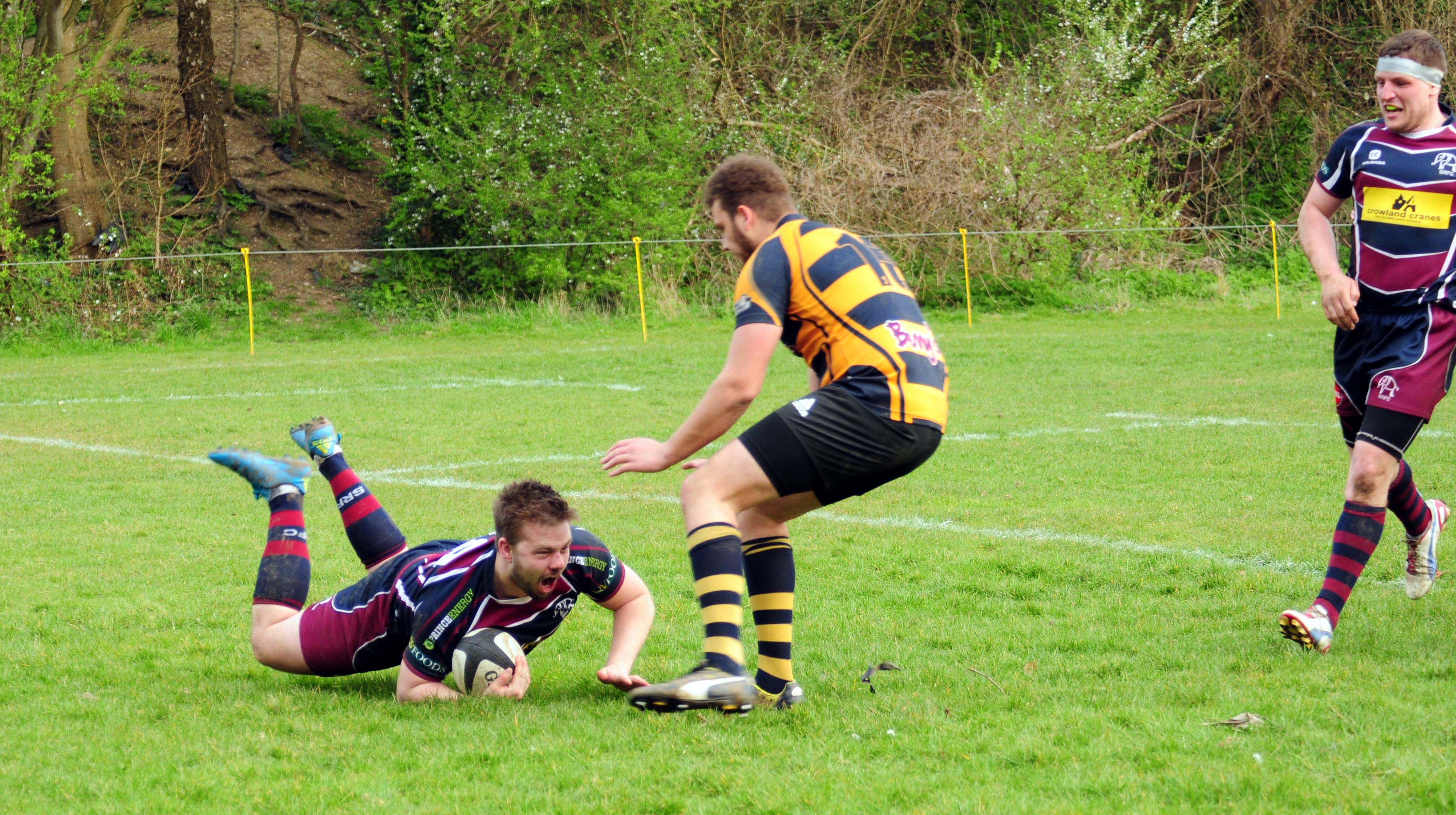 GET IN THERE! George Brown crashes over the whitewash to score for Spalding RFC on Saturday. Photo by ADRIAN SMITH