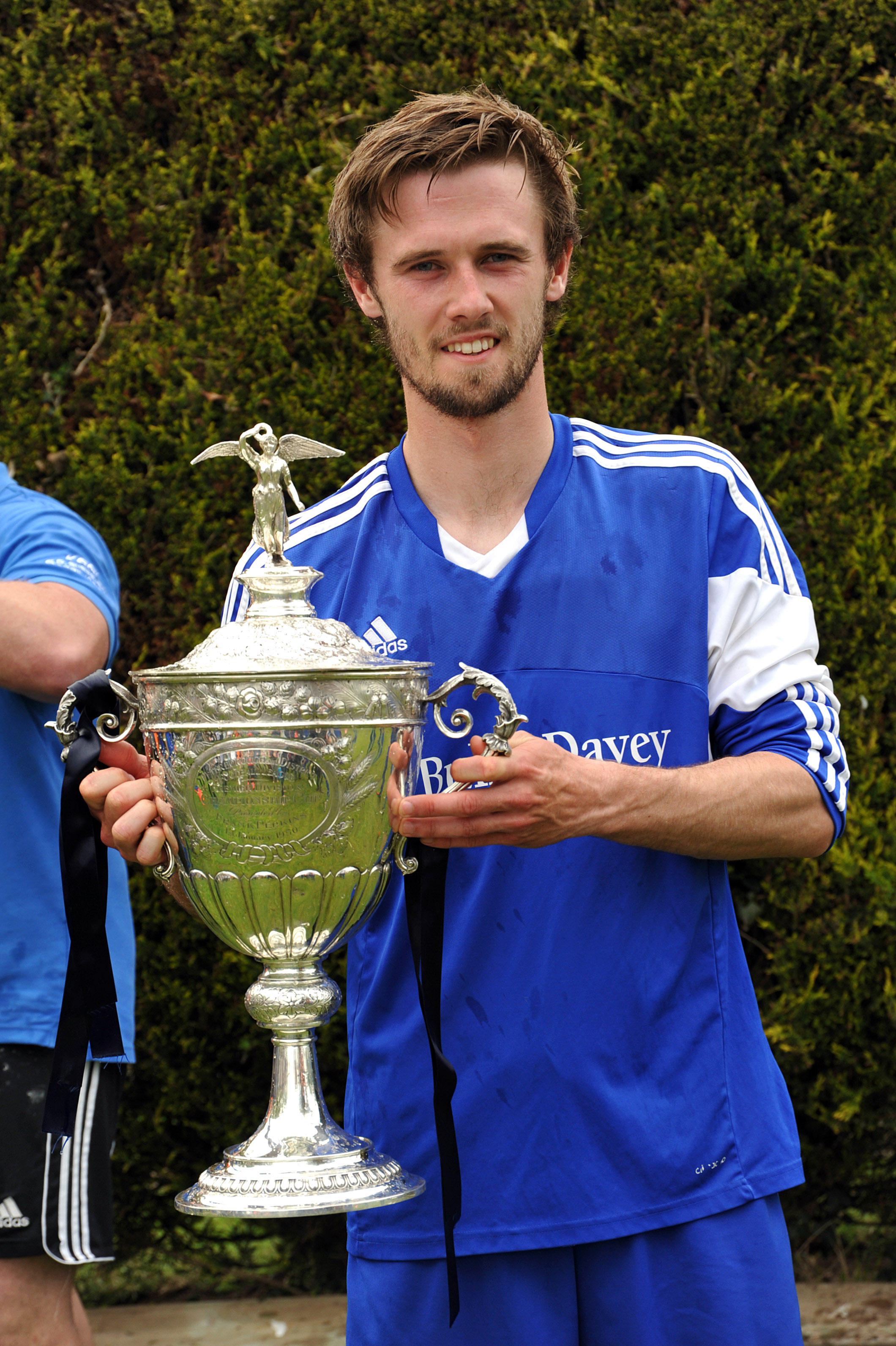 DANGERMAN: Nobody at Moulton or Pinchbeck has scored more goals (42) than Harrox’s Ollie Maltby this season. He is pictured with the PDFL Premier Division title on  Saturday. Photo (by NIKKI CLUCAS): VNC070516-51
