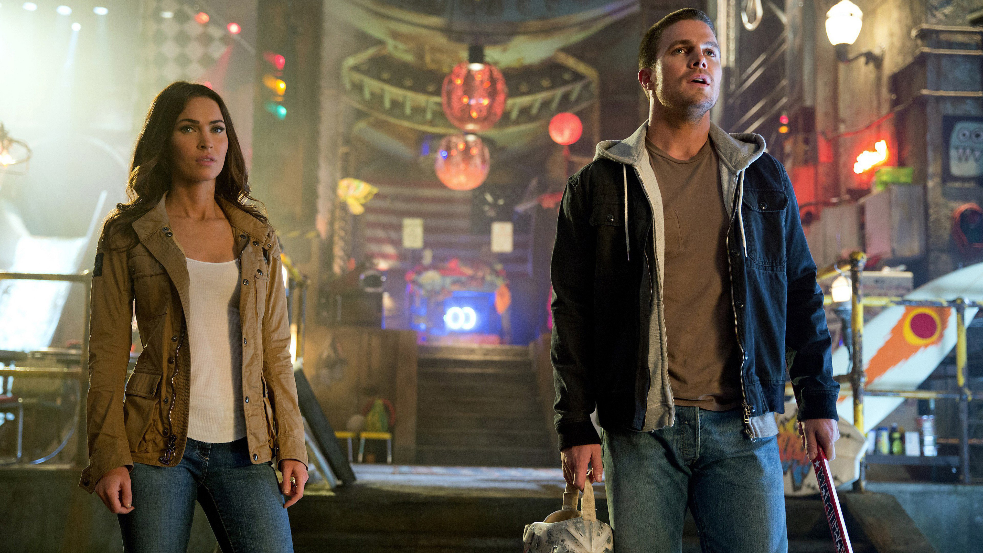 GOOD CHOICES: Megan Fox and Stephen Amell in TMNT 2.