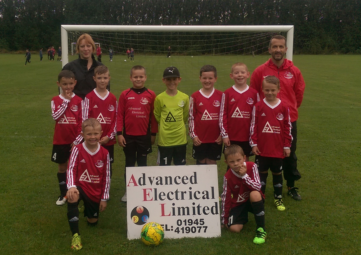 KITTED OUT: Tydd St Mary under-9s are pictured in their new AEL sponsored strip. Back (from left) – Corey Upson, Dawn Ashton from AEL, Lewis Melvin, Aaron Wright, Louis Cooper, Archie Court, Bryn Ashton, Gary Pratt (manager) Jaydon Lee; Front – Kai Mackie and Bailey King.
