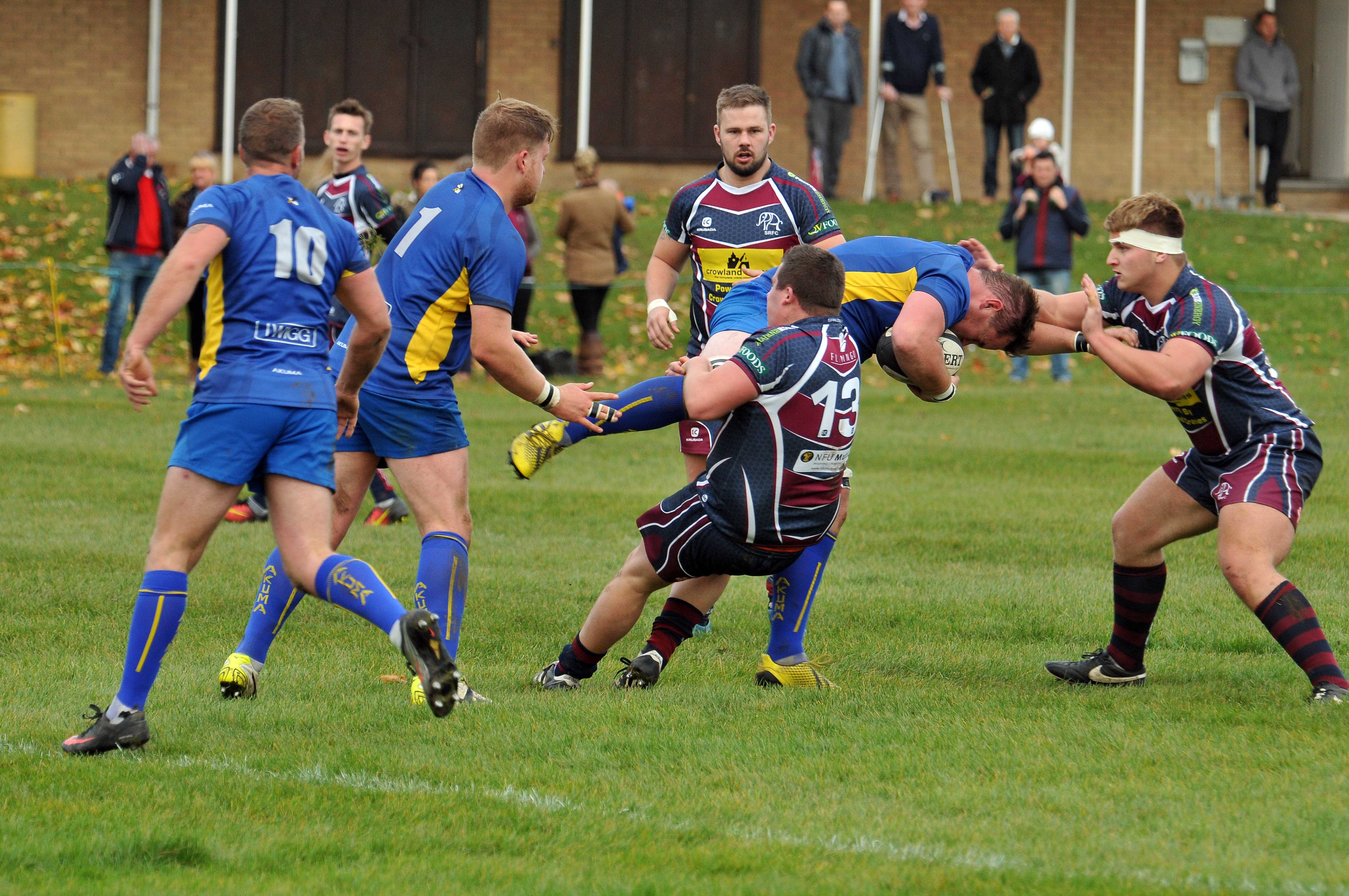 DOUBLE TEAM: Spalding RFC stop at Matlock attack on Saturday. Photo by ADRIAN SMITH
