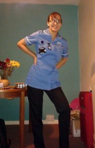 Proud Ella in nurse’s uniform.